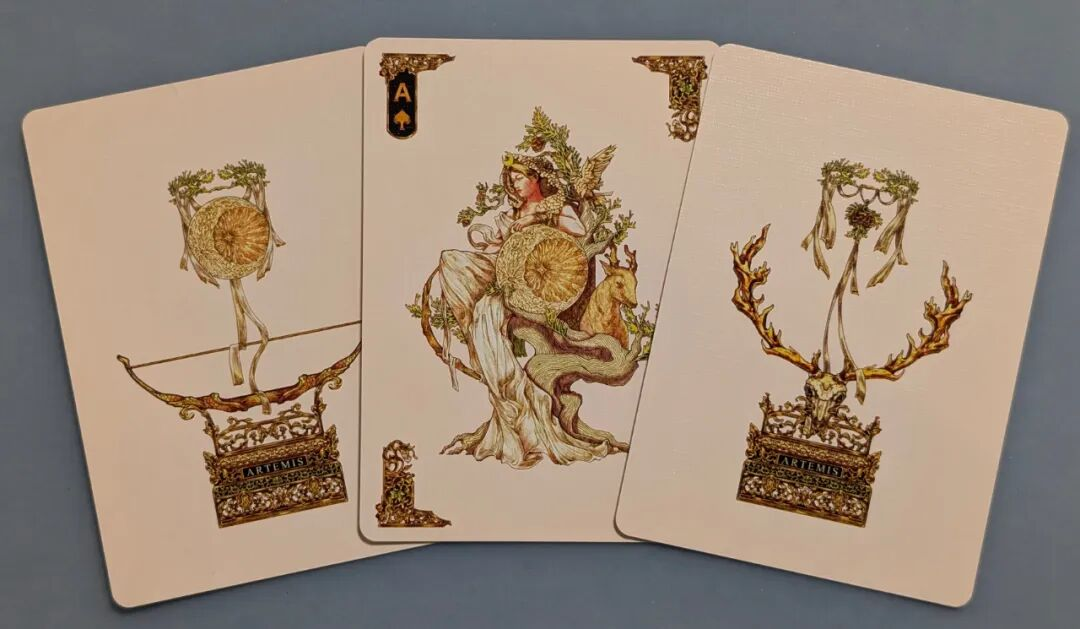 Artemis's Joker design, featuring her bow and arrow and deer as core elements